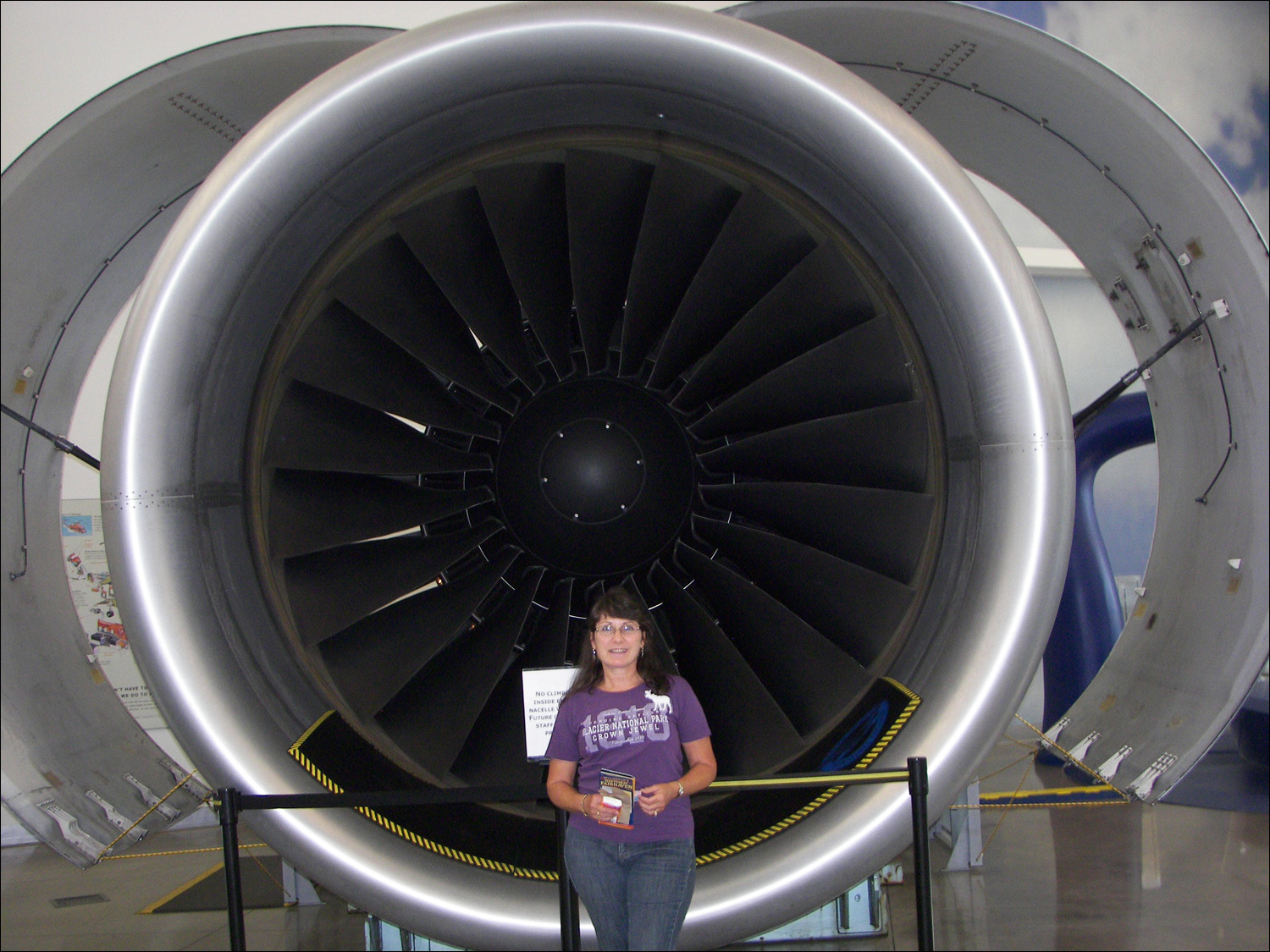 Everett,WA- Boeing tour~Katherine standing in front of a 747 engine